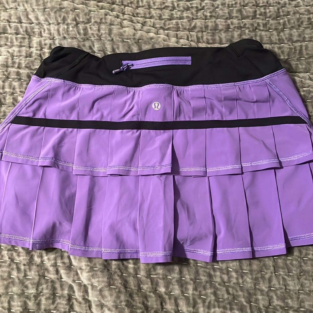 Purple Lululemon tennis skirt. Pleating on back. Adjustable waist.